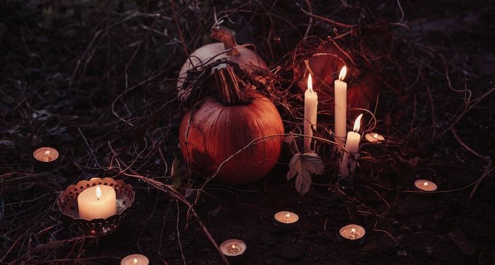 halloween tableau with pumpkins and candles.jpg.optimal